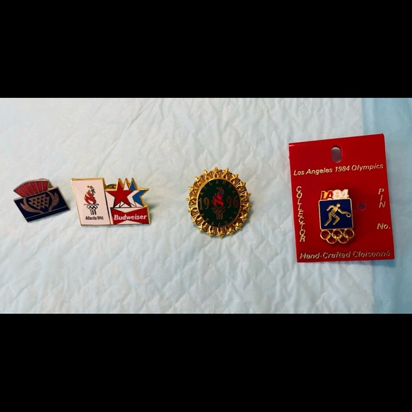 various Jewelry - Collection 9 various Olympic pins. Some brand new. Some lovingly worn. Perfect